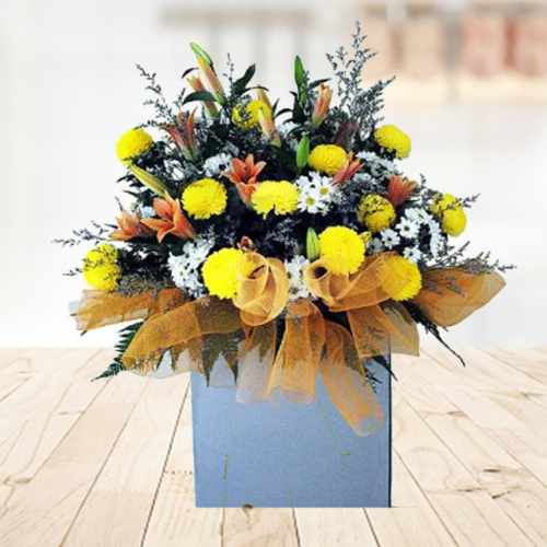 Funeral Flowers of Lilies and Chrysanthemum.