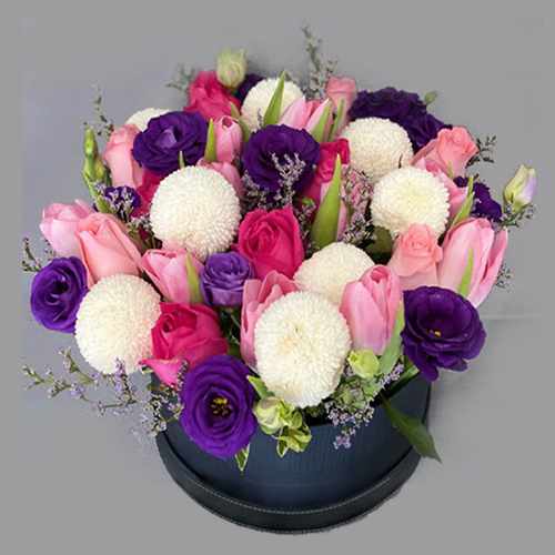 Tulips Roses and Eustomas in a Rounded Box