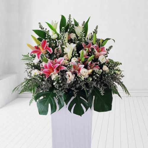 Funeral Arrangement of Lilies and Eustomas