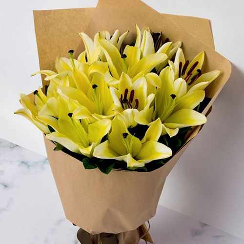 Bouquet of Yellow Lilies and Tea Leaf