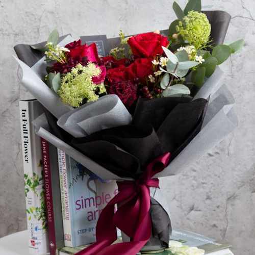Hand Bouquet of Luxurious Blooms of Roses