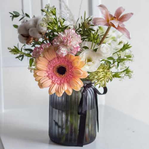 White Gerberas and Lght Pink blooms in Vase