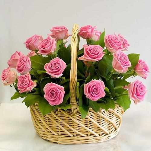 Graceful Pink Rose arrangement in a wicker Basket