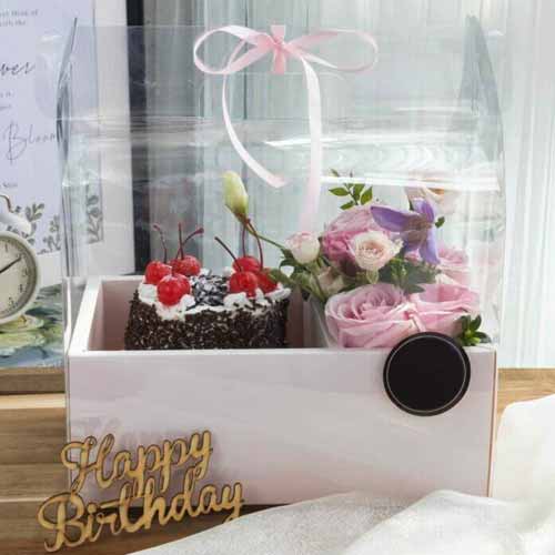 Black Forest Cake And Flower Arrangement
