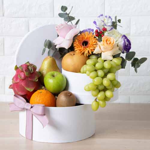 Fresh Fruits And Flowers In Hat Box