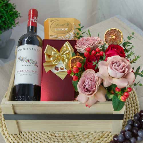 Red Wine Chocolates And Flower Arrangement