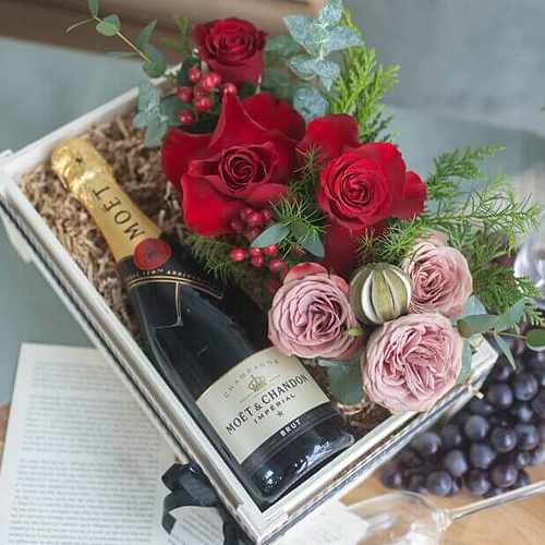 Moet And Chandon With Flower Arrangement