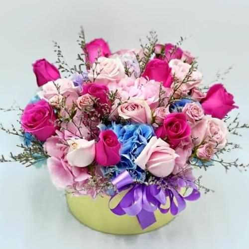 Pink Roses Arrangement in a Rounded Box 